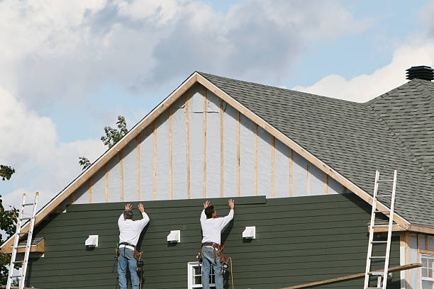 Professional Siding Contractor technician working in Adah, PA